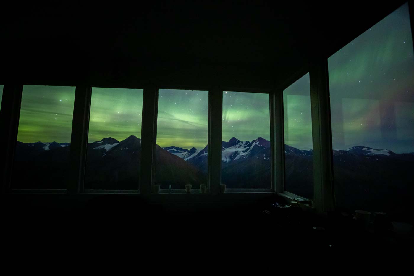 Northern lights from inside Glacier Lookout